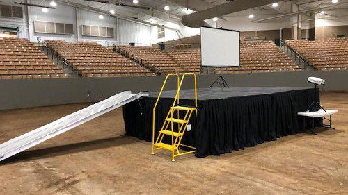 Stage at the center of a hall